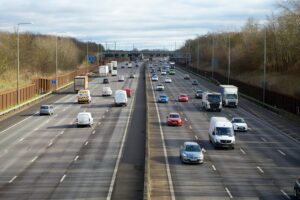Aerial view of vehicles on a busy highway outside St Albans, England during daytime.