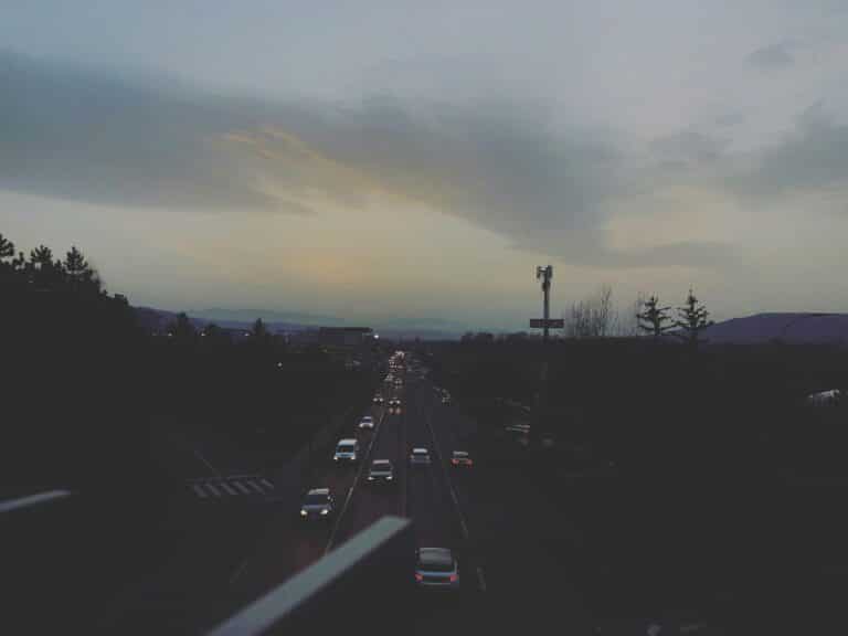 cars on road during sunset