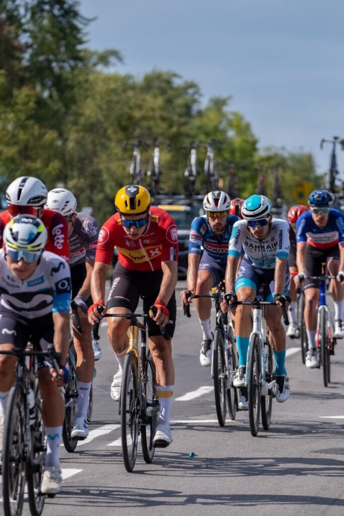 Cyclists in a race on a sunny day