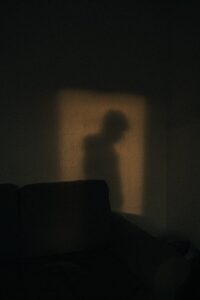 black sofa chair near white wall