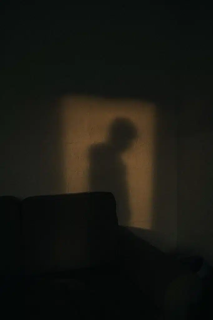 black sofa chair near white wall