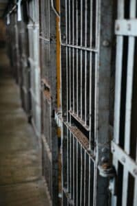a close up of a jail cell with bars