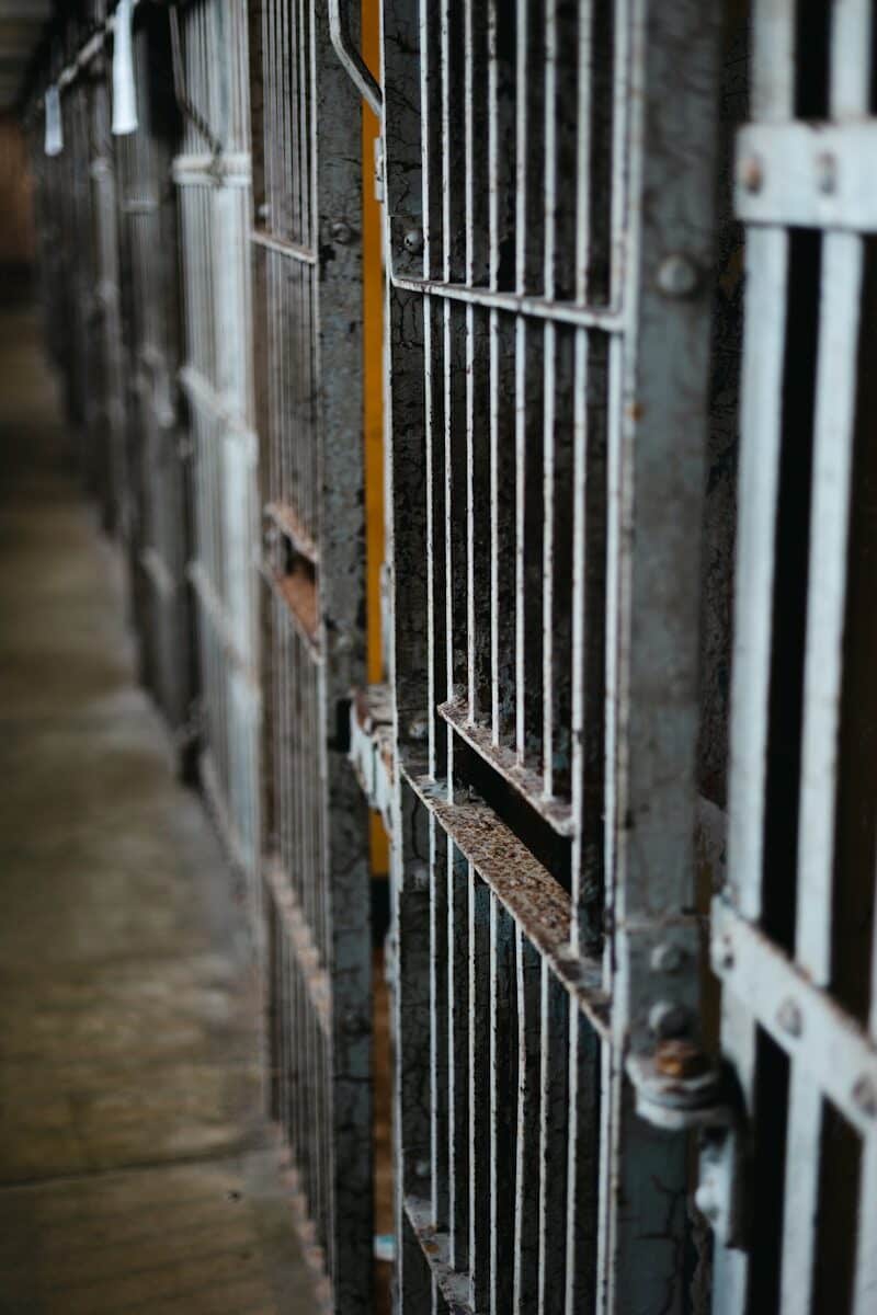 a close up of a jail cell with bars