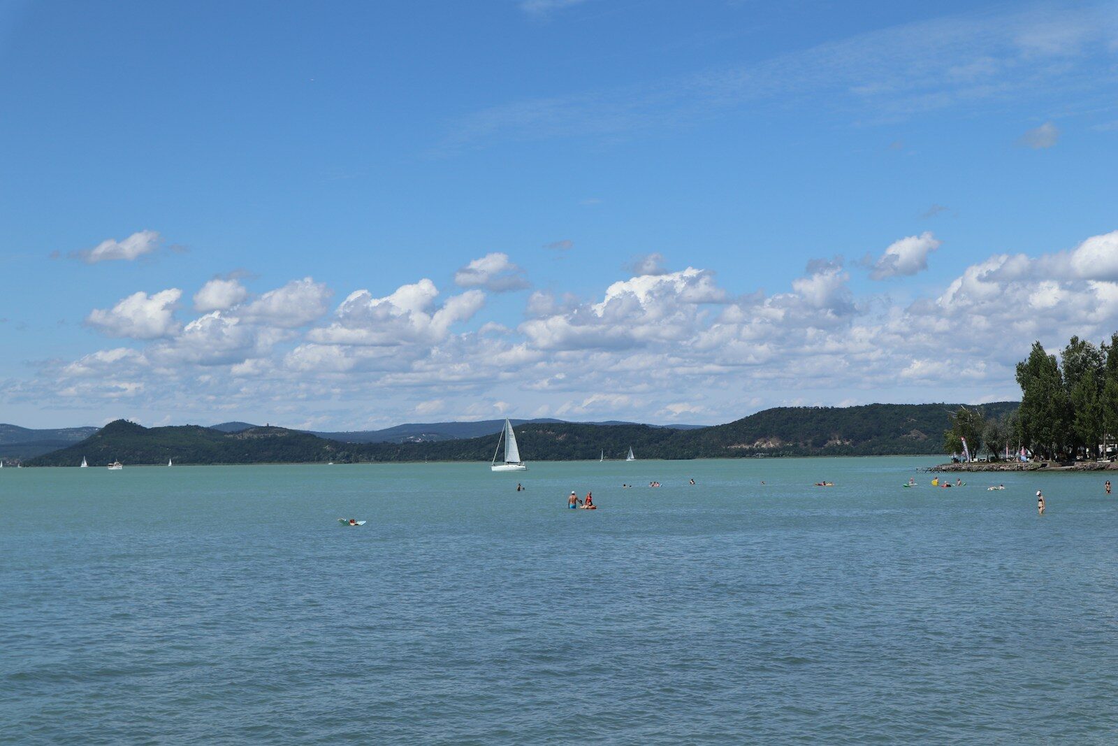 A body of water with boats floating on it