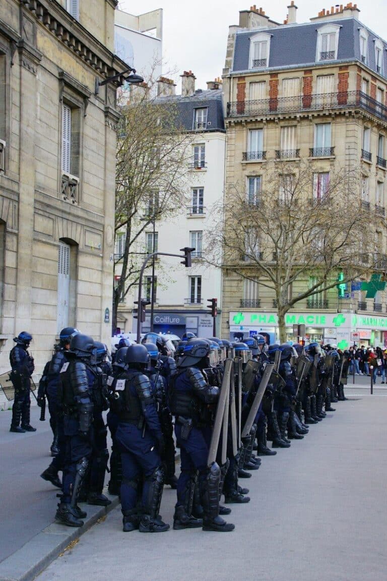 a group of police officers standing in a row